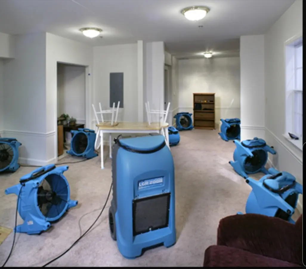 Air movers and dehumidifier setup for Water Damage Restoration in Rockville